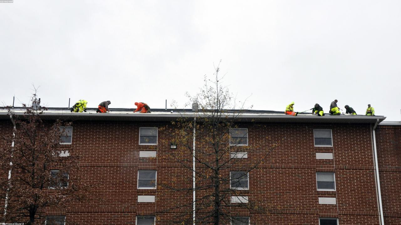 Storm-damage repair on an asphalt shingle roof in Solon, OH