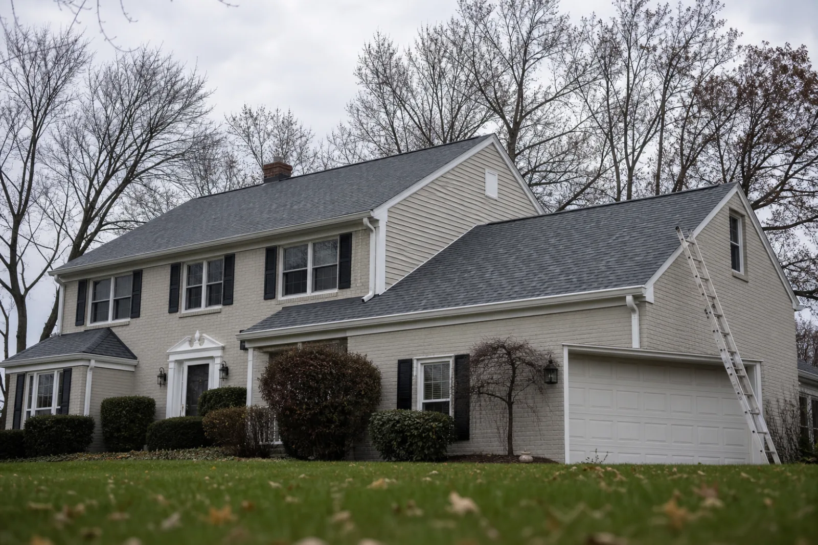 Freshly completed asphalt shingle roof on a two-story colonial in Cleveland, OH